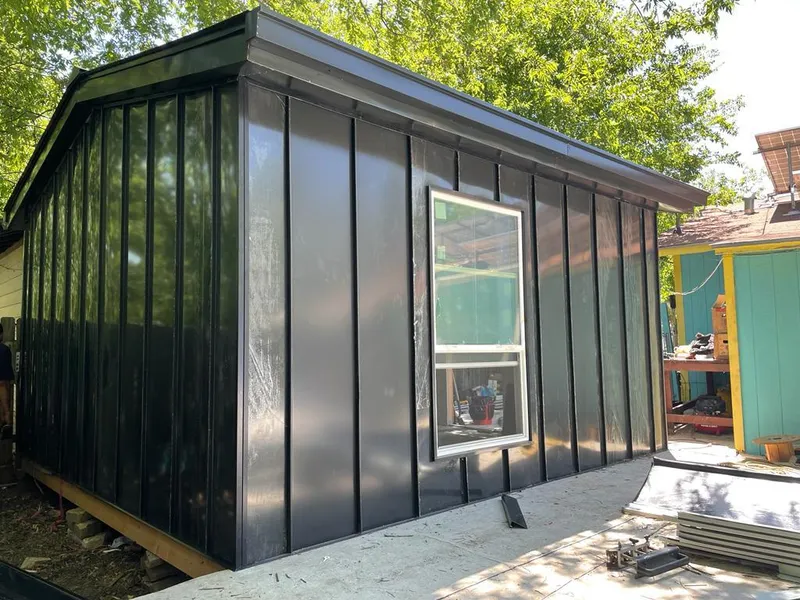 Black standing seam metal wall panels for Metal Roof Installation in North Fort Myers