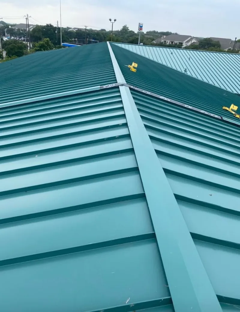 Green commercial metal roof ridge and valley for Metal Roof Repair in North Fort Myers